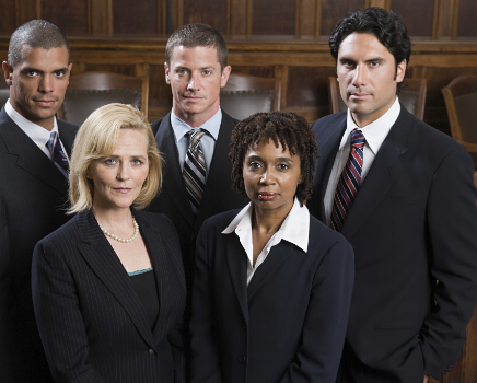 Group of lawyers standing in courtroom