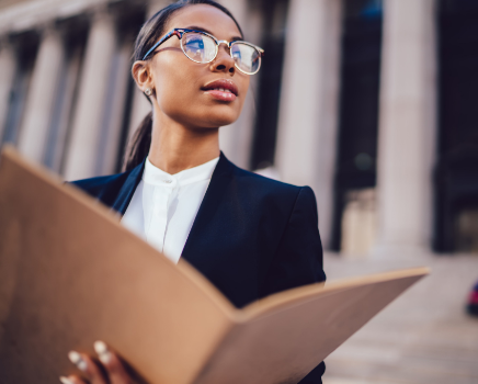 Law student standing outside court building