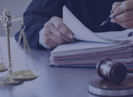 Judge at desk with paperwork