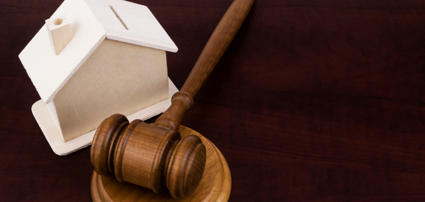 gavel and house on wood gavel and house on wood